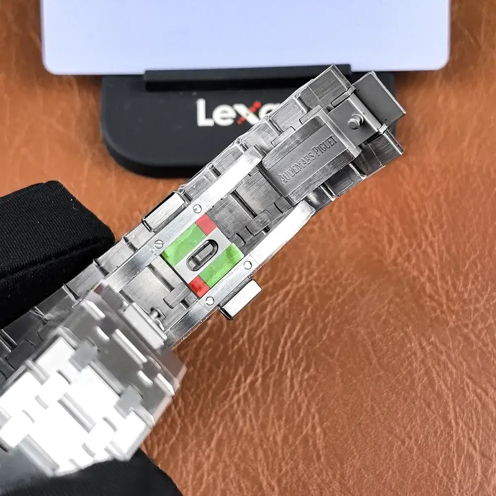 QC image of watch clasp open view, showing clasp structure, inner finish, and locking mechanism