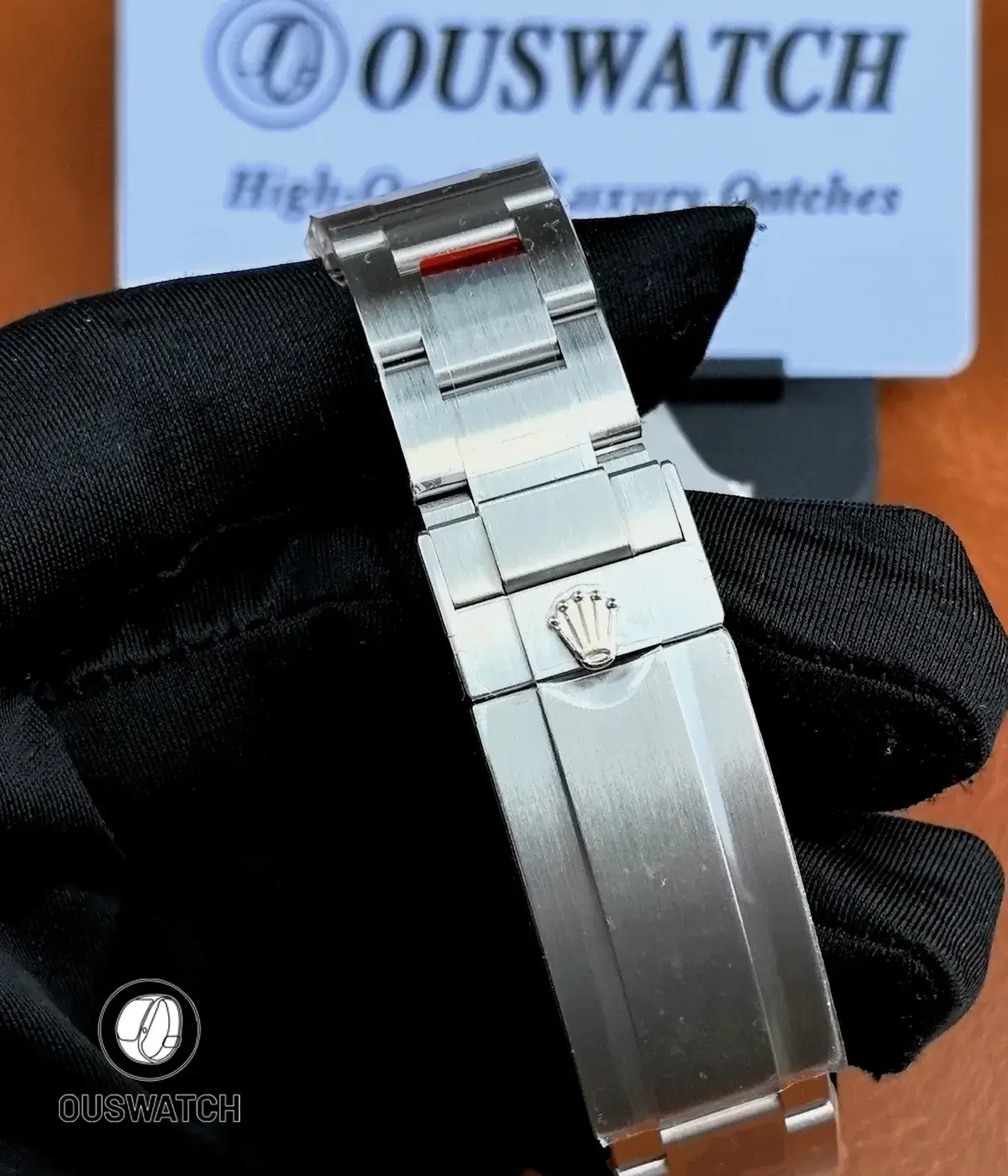 Detailed view of the Rolex 126610LN Oyster bracelet clasp, highlighting the brushed steel finish and secure folding mechanism