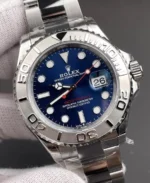 Macro close-up of the Rolex Yacht-Master 40 blue sunburst dial and applied hour markers