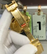 Detail of the Oysterflex-style clasp and strap fit on the Rolex Yacht-Master 42 super clone, showing the connection and wearing structure.