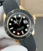 Close-up shot of the Rolex Yacht-Master 42 black dial indices, highlighting marker finish and dial detailing.