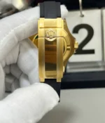 Detailed view of the Oysterflex-style strap on the Rolex Yacht-Master 42 super clone, showing strap texture and fit.