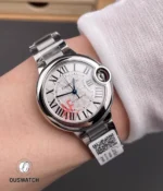 On-wrist shot of the super clone Cartier Ballon Bleu WSBB0044 33mm, showing a comfortable women’s fit and elegant stainless steel finishing.