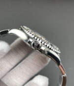 Close-up of the crown on the Rolex Yacht-Master 40 126622 rhodium dial super clone, showing crown engraving and case finishing.