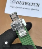 Close-up image of the clasp on the Patek 5968G with green dial, highlighting the fastening mechanism and the premium finish of the hardware.