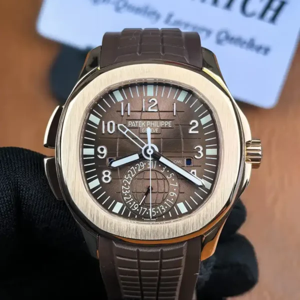 Front-facing view of the Aquanaut Travel Time 5164R in rose gold, showcasing the brown dial, dual-time display, and the signature rounded octagonal case shape.