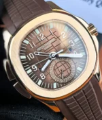 Close-up image centered on the dial of the 5164R-001, emphasizing the embossed pattern, Arabic numerals, and the clearly arranged travel time indications.