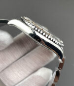 Side profile of the Rolex Yacht-Master 40 rhodium dial case highlighting the polished case edges and crown guards.