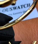Close-up of engraving and markings detail on the watch.