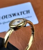 Close-up of the lug area on the Cartier Baignoire Mini WGBA0035.
