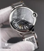 Black dial detail with Roman numeral markers and sword-shaped hands.