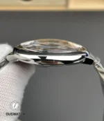 Side profile showing the rounded 42mm stainless steel case and protected crown structure.
