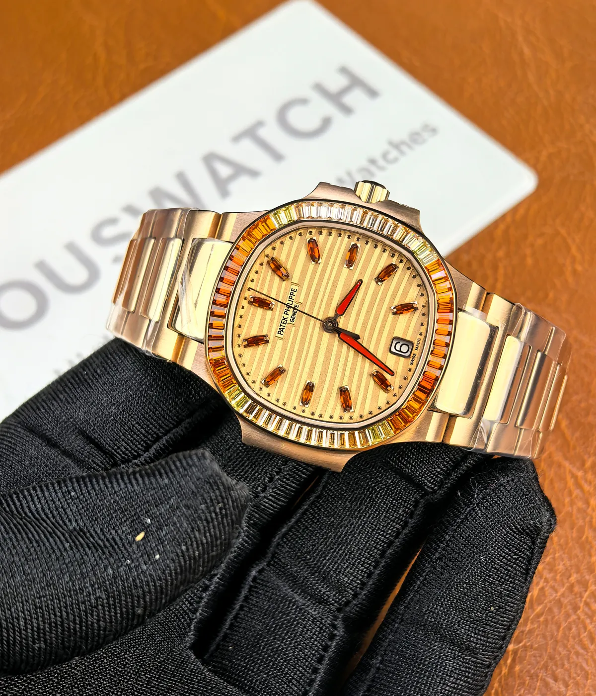 Full panoramic view of the rose gold luxury sports watch with integrated bracelet and diamond bezel.