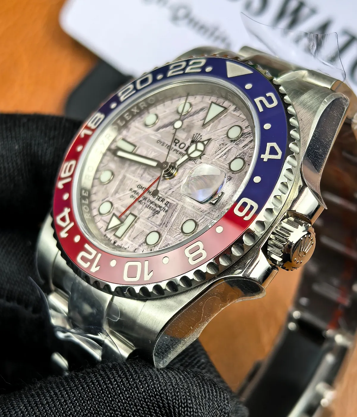 Side angle view of the crystal and case profile on the Rolex GMT-Master II 126719BLRO-0002.