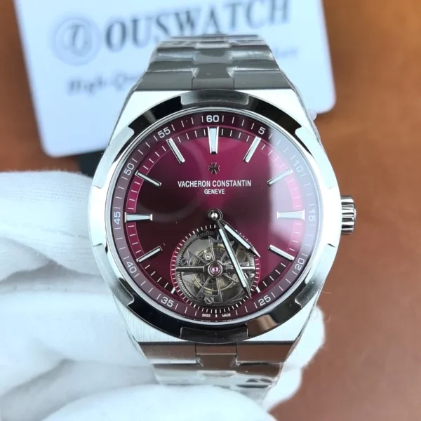 Front view of the Vacheron Constantin Overseas Tourbillon 6000V/210T-H179 replica watch with red dial and integrated bracelet.