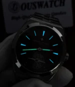 Night lume display of the Vacheron Constantin Overseas Tourbillon 6000V watch with illuminated markers and hands.