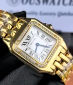Close-up of the Cartier WGPN0047 silver dial with Roman numerals and blue hands.