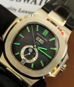 Night lume display of the super clone Patek Philippe Nautilus 5726A-001 Annual Calendar, showing glowing hands and markers for low-light legibility.
