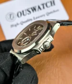 Crown close-up of the super clone Patek Philippe Nautilus 5726A-001 moonphase, showcasing the polished crown detailing and case-side finishing.